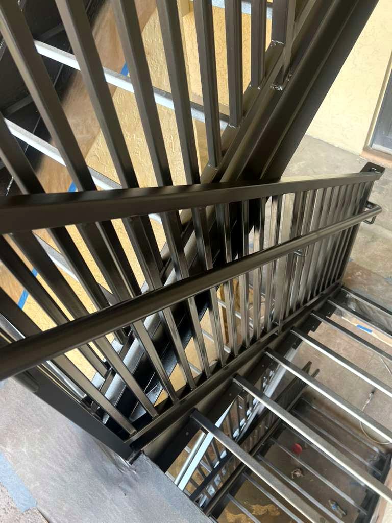 Metal stair finish by AMM PAINTER LLC